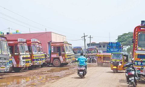 Container trucks parked at a residential area in Manali New Town