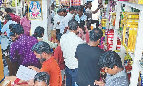 Customers throng cracker shops in Sivakasi