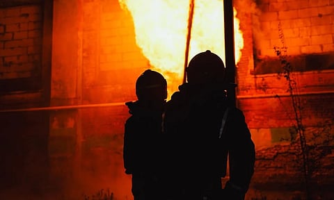 In this photo provided by the Ukrainian Emergency Services on Tuesday, Oct 14, 2025, rescue workers put out a fir of a hospital damaged by a Russian strike in Kharkiv, Ukraine.(Photo: AP)