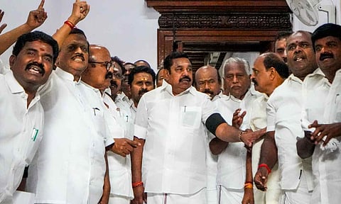 Leader of Opposition in Tamil Nadu Assembly Edappadi K Palaniswami and other AIADMK MLAs raise slogans wearing black armbands as they stage a walkout amid the ongoing state Assembly session, at Fort St. George, in Chennai, Wednesday, Oct. 15, 2025. (PTI)&nbsp;