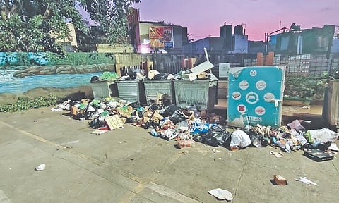 Overflowing garbage bins placed outside the L&amp;M Block of TAISHA TNHB complex in Nadesan Nagar, Virugambakkam