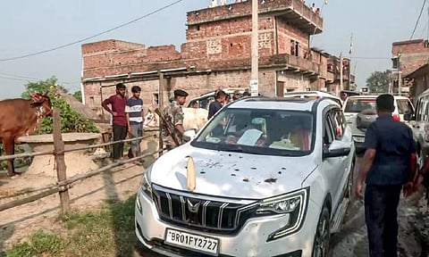 RJD supporters hurl cow dung at the convoy of Bihar deputy Chief Minister and BJP candidate from Lakhisarai constituency Vijay Sinha at a village, in Lakhisarai, Bihar (Photo: ANI)