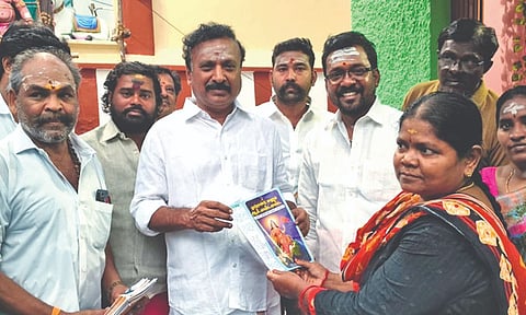 BJP leaders handing over centenary brochure of the RSS as part of the celebrations on November 6 in Madurai