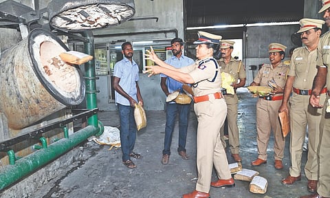 ACP Bhavaneeswari feeds a ganja package to the incinerator