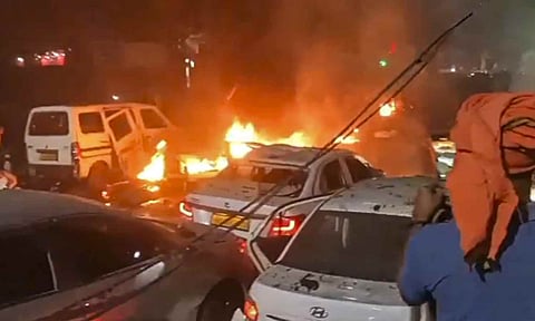 Flames rise after a blast occurred in a parked car near Red Fort, leaving multiple vehicles in flames, in New Delhi, Monday, Nov. 10, 2025 (PTI)&nbsp;