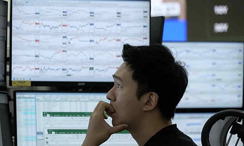 A currency trader watches monitors at the foreign exchange dealing room of the Hana Bank headquarters in Seoul, South Korea, Friday, Nov. 14, 2025 (AP)&nbsp;