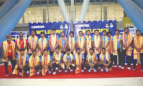 The Indian junior team poses for picture upon arrival at the airport