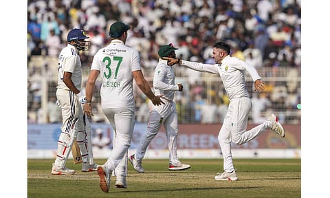 South Africa's Keshav Maharaj with teammates celebrates after the team wins during the third day of the first Test cricket match of a series between India and South Africa, at Eden Gardens in Kolkata, Sunday, Nov. 16, 2025 (PTI)&nbsp;
