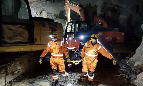 Rescue operation underway after a portion of a stone quarry collapsed, in Sonbhadra, Uttar Pradesh (PTI)&nbsp;