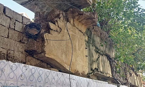 Damaged wall between Park Town railway station and RGGGH