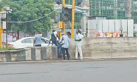 Pedestrians dangerously cross the road near Tambaram Sanatorium