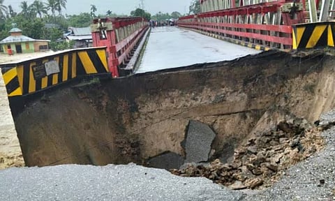 This photo released by National Agency for Disaster Countermeasure (BNPB) shows a bridge destroyed by a flash flood at North Tapanuli, North Sumatra Province, Indonesia. (AP)