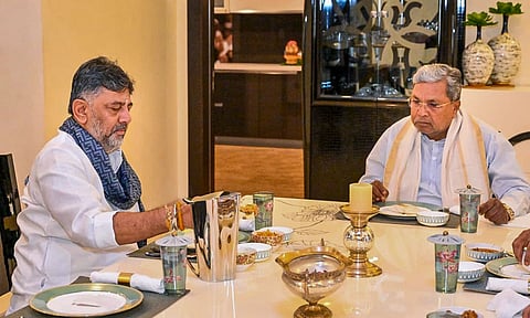 Karnataka Chief Minister Siddaramaiah with Deputy CM DK Shivakumar during a breakfast meeting at his residence, in Bengaluru, Karnataka. (Photo: PTI)