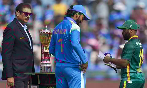 India's captain KL Rahul, center, and South Africa's captain Temba Bavuma, right, during the toss before the second ODI cricket match of a series between India and South Africa, at Shaheed Veer Narayan Singh International Stadium, in Raipur, Chhattisgarh, Wednesday, Dec. 3, 2025 (PTI)&nbsp;