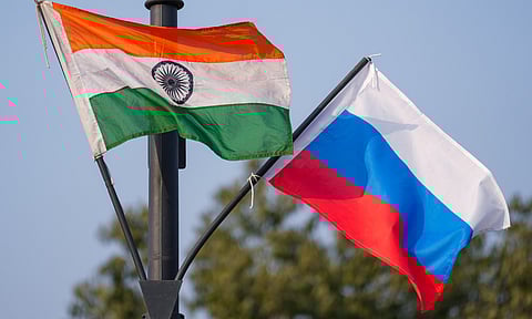 he Indian national flag and the Russian flag flutter on lamp posts along Kartavya Path ahead of Russian President Vladimir Putin's visit to India, in New Delhi