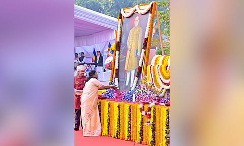President Droupadi Murmu pays tribute to Babasaheb Ambedkar, the architect of India's Constitution, on his 69th death anniversary, also called Mahaparinirvan Diwas, at the Parliament House complex, in New Delhi. (PTI)