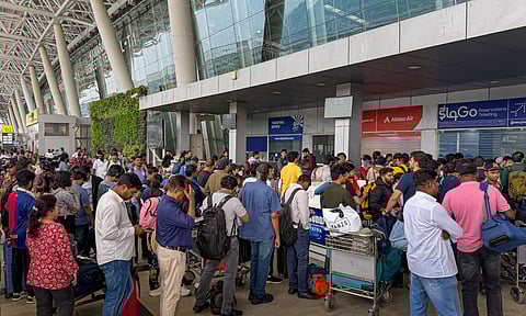 Chennai: Passengers wait in queues to enquire about flight status at Chennai Airport amid IndiGo flight disruptions, Friday, Dec. 5, 2025. (PTI)&nbsp;