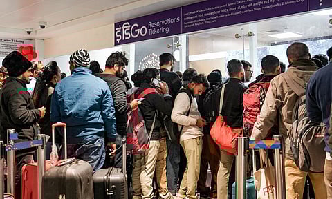 Passengers stand in a queue at an IndiGo airline's counter at Terminal 1 (T1) of the Indira Gandhi International Airport, in New Delhi, Saturday, Dec. 6, 2025. (PTI)&nbsp;