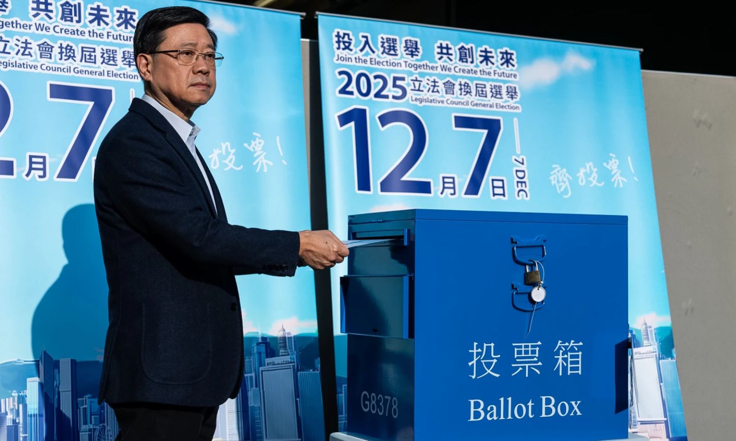 Hong Kong’s Chief Executive, John Lee casts his ballot at a polling station during the Legislative Council General Election in Hong Kong. (Photo: AP)