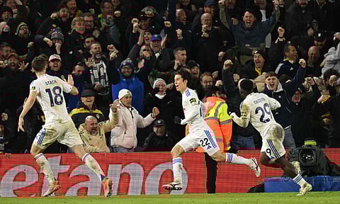 Ao Tanaka (C) celebrates after scoring the winner against Liverpool&nbsp;
