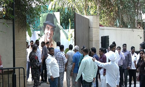 Fans gather outside Dharmendra's residence (ANI)