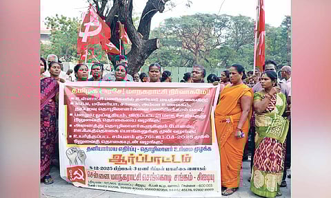 Contract and temporary workers staged a protest at Panagal Maaligai on Monday