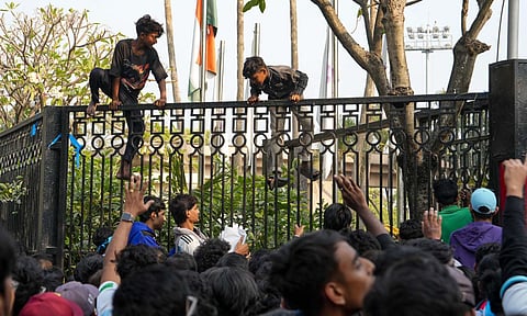 Agitated fans try to enter a hotel where Argentine footballer Lionel Messi is staying, after chaos erupted at an event as part of his 'G.O.A.T. India Tour 2025', in Kolkata (PTI)