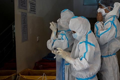 Medical workers wear personal protective equipment (PPE) as they get ready to treat patients suffering from the coronavirus disease (COVID-19), at the Max Smart Super Speciality Hospital in New Delhi, India