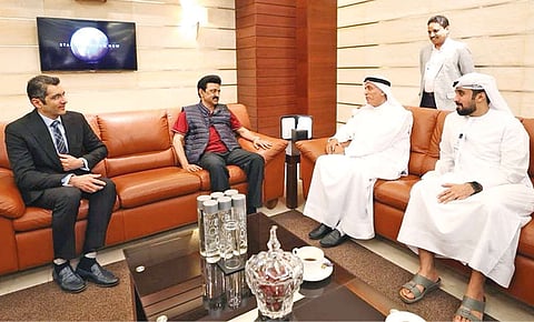 Chief Minister MK Stalin having a brief discussion with local officials in Dubai on Thursday