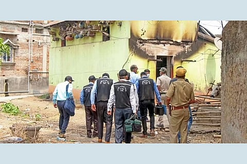 CBI's Central Forensic Science Laboratory's (CFSL) experts collect samples from the houses where eight people were burned alive.