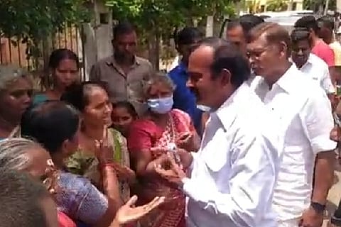 Public pour out their grievance to Minister for Housing and Urban Development S Muthusamy during an inspection in Salem on Sunday