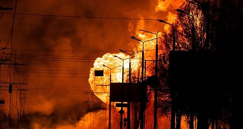 A gas station burns following Russian attacks in the city of Kharkiv