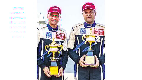 Karna Kadur (right) and his co-driver Nikhil Pai with their trophies