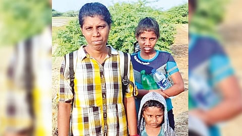 Varshini with her daughter Ninika and son Rangison at Dhanushkodi on Wednesday.