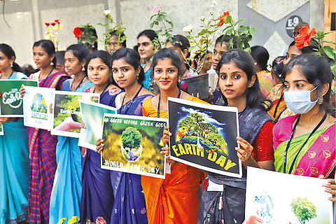 Students of Valliammal College for Women hold an awareness drive on the occasion of World Earth Day.