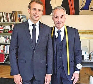 Macron counts on an everyman’s tailor for spartan suits