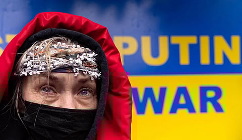 A protester attends a rally against Russia's military operation in Ukraine