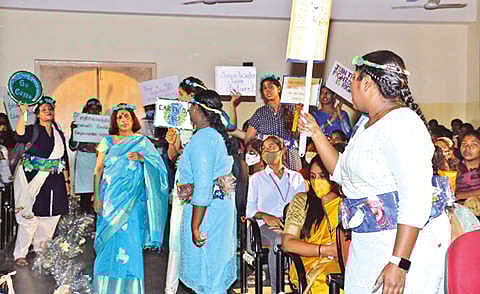 Students performing play