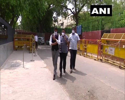 TTV Dhinakaran (middle) at the ED office.