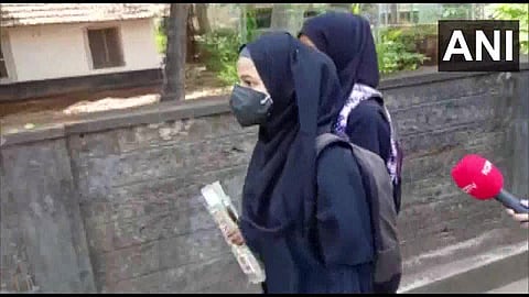 Alia and Resham return home as they were not allowed to write the exam wearing hijab (Source: ANI)