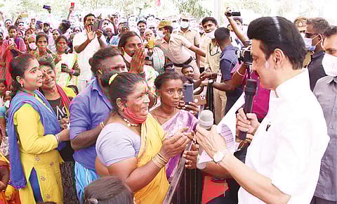 Chief Minister MK Stalin interacting with residents of Sengadu village in Kancheepuram on Sunday.