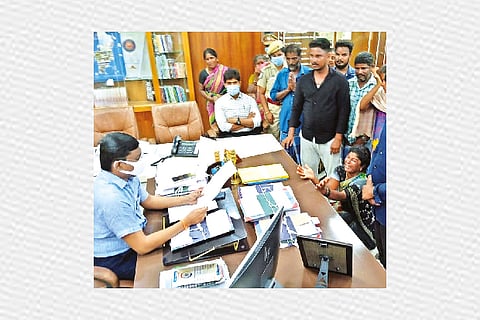 Thangamani?s family members submitting a petition to Tiruvannamalai Collector B Murugesh on Friday