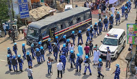 Rapid Action Force personnel keep vigil after clashes broke out between two communities at Jahangirpuri