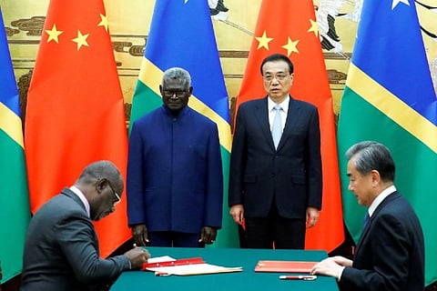 Solomon Islands PM Manasseh Sogavare and Foreign Minister Wang Yi