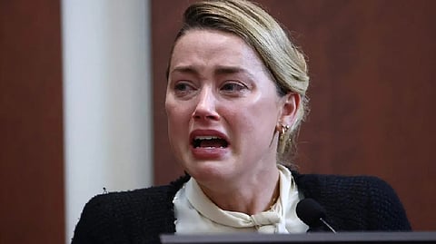 US actress Amber Heard testifies at the Fairfax County Circuit Courthouse in Fairfax, Virginia