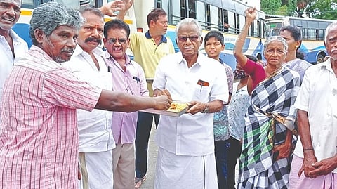 Members of Tamil Desiya Perioyakkam led by president P Maniarasan distributing sweets in Thanjavur on Wednesday