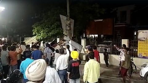 Supporters of slain Punjabi singer and Congress leader Sidhu Moose Wala protest against the Bhagwant Mann government outside the Mansa Civil Hospital