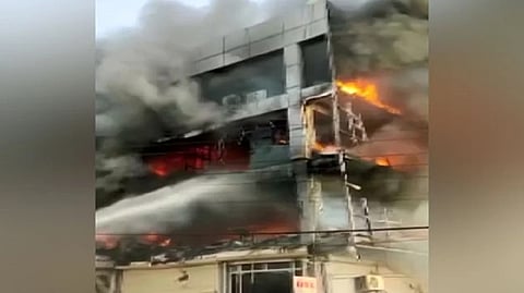 Fire breaks out in a building near pillar no 544, Mundka metro station.