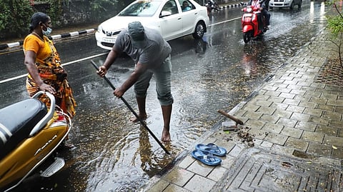A worker clearing chamber to remove the stagnated water