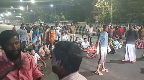 Residents protest over power cuts on Anna Salai on Wednesday night.